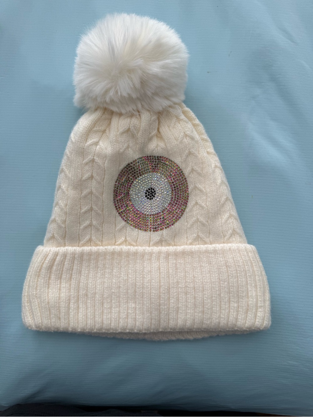 Cream Women’s Pom Beanie with Evil Eye Medallion